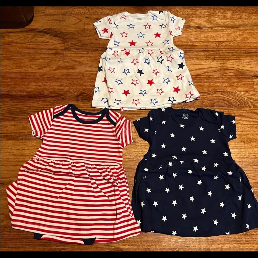 - NWOT - -Amazon Stars and Stripes onsies. Set of 3